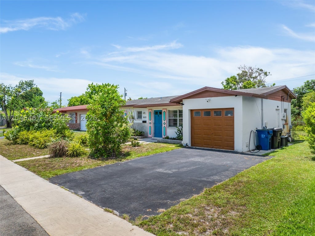 Photo of 3620 NW 24th St, Lauderdale Lakes, FL 33311 (MLS # A12046467)