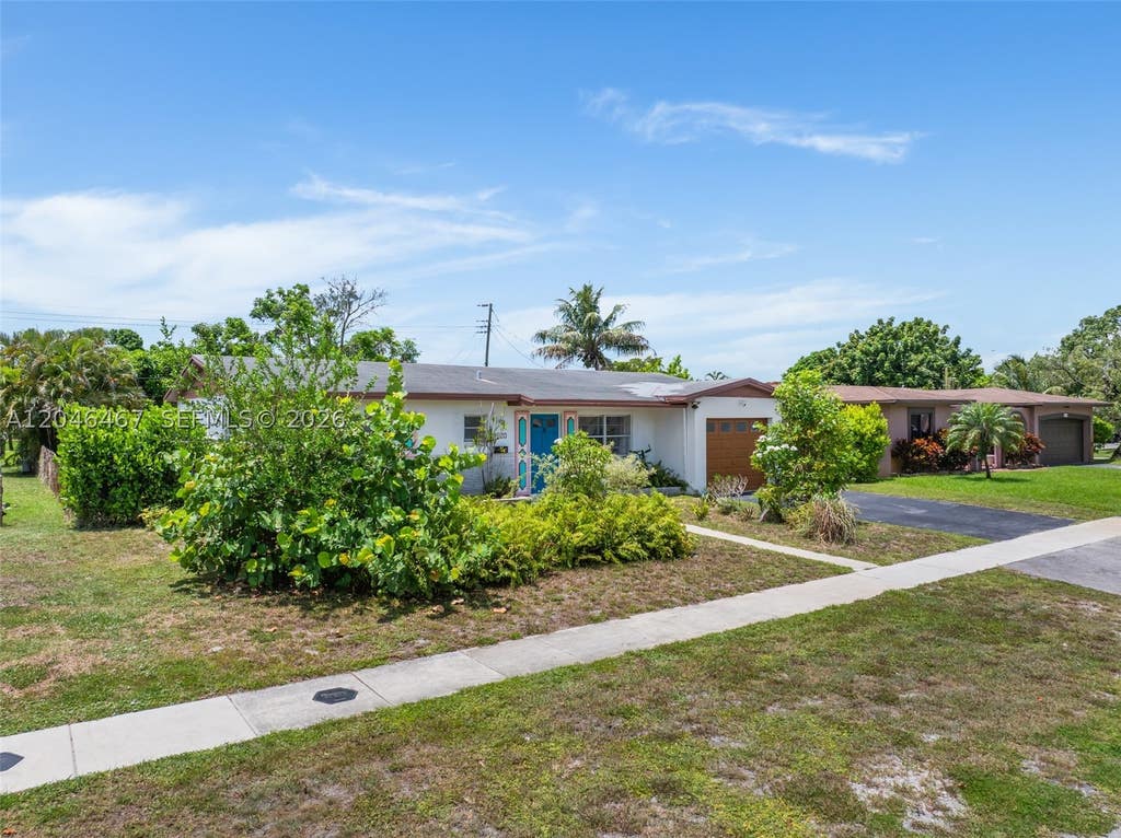 Photo of 3620 NW 24th St, Lauderdale Lakes, FL 33311 (MLS # A12046467)