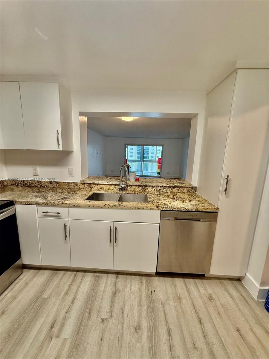 Photo of 311 SE 3rd St #206, Dania Beach, FL 33004 (MLS # A11832052)