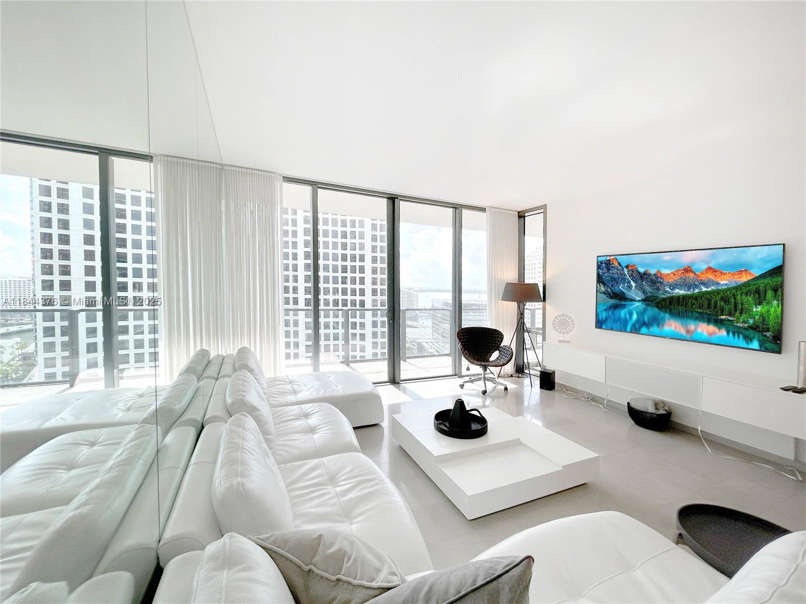 VIDEO AVAILABLE - Fully Furnished Spanning 1,856sf, 3 bedrooms, 3.5 bathrooms,+ office or dining area DEN. Luxury space with phenomenal views. Imported Italian marble flooring, floor to ceiling sliding glass, and modern Italian kitchen. providing ample space for comfortable livingThis unit comes designer turn-key furnished, just bring your toothbrush. Biometric technology elevator access, premium Bosch appliances, designer Duravit Sensawash water closet, 48 bottle temperature controlled wine storage, and much more make this the ultimate Brickell living experience. Full-time concierge and 24 hr security.