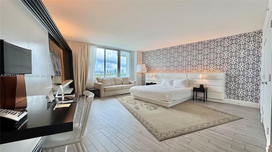 High-floor furnished studio with wide bay views. Part of the hotel rental program, offering fully managed short-term income potential. Access to 5-star amenities: bayfront pool, spa, fitness center, Sunset Bar, Baia Beach Club, room service, concierge, marina, and more. $20M renovation recently completed. Includes valet parking. No condo approval. Showings require 2–3 days’ notice. No weekend showings permitted.