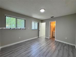 HOLLYWOOD PLACE CONDOMINI - Residential Lease