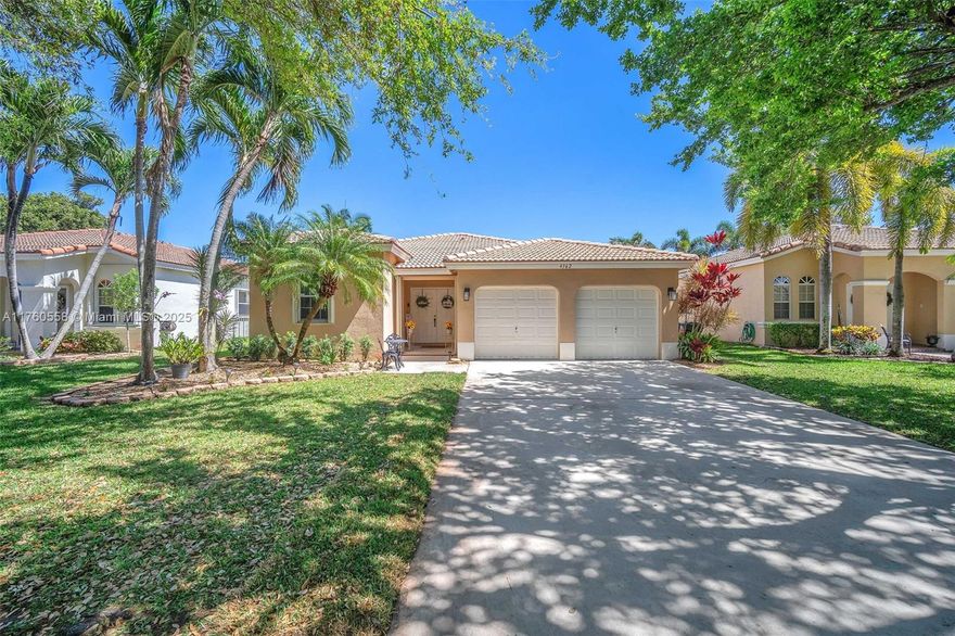 Welcome to this stunning waterfront home in a gated community with a pool and children's playground! This 4-bedroom, 3-bathroom residence boasts a triple-split floor plan, offering privacy and functionality. Enjoy breathtaking canal views from the screened patio and experience the elegance of an open-concept layout. Completely remodeled, this home features vinyl flooring with tall baseboards, a modern kitchen with espresso color cabinets, quartz countertops, an island, and stainless steel appliances.  HOA Includes Cable and Internet. The spacious 2-car garage adds convenience. Don’t miss this incredible opportunity to own a move-in-ready, beautifully updated home!