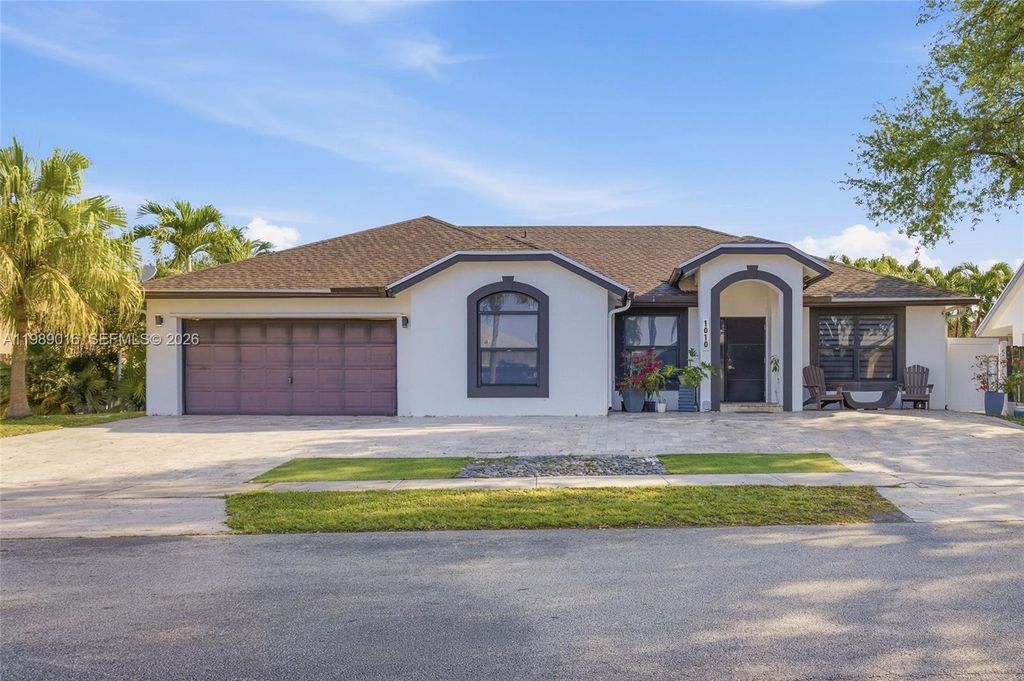 Photo of 1010 SW 149th Ln, Sunrise, FL 33326 (MLS # A11989016)