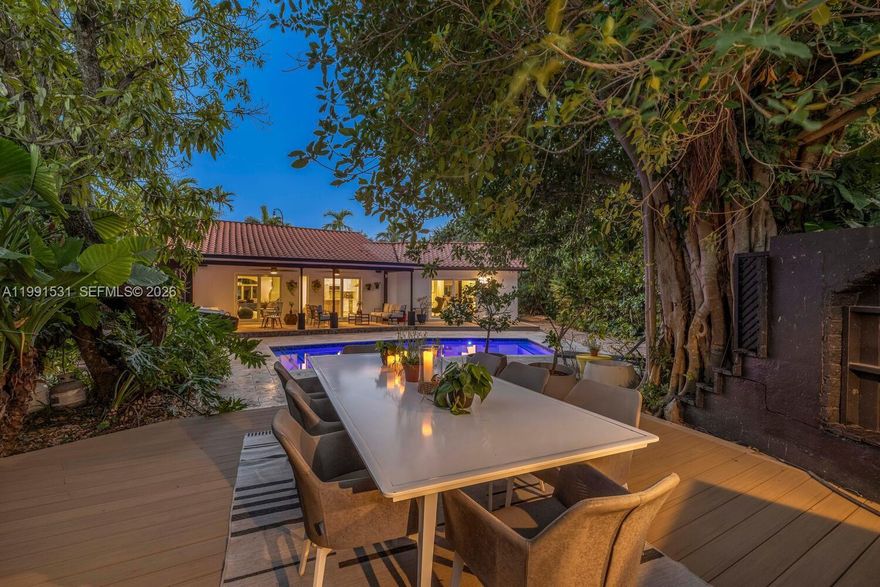 Positioned at the end of a gated cul-de-sac in Miami Shores, this fully renovated 3-bedroom, 3-bath residence delivers privacy, space, and convenience in one of the area’s most connected locations. Set just off Biscayne Boulevard, the home enjoys immediate access to everything while maintaining a quiet, tucked-away feel that’s unexpected for its central position. Inside, the home opens to a spacious and well-executed layout, highlighted by an oversized primary suite with a substantial custom closet and direct access to the pool. The scale, flow, and natural light throughout create a sense of comfort typically found in larger homes.
Designed for effortless South Florida living, the outdoor space functions as a true extension of the home, complete with a covered terrace, outdoor kitchen, cabana bath, and a private pool setting that feels like a retreat. Located in a low-traffic pocket with gated privacy and a garage, this property offers a rare combination of accessibility, seclusion, and lifestyle in Miami Shores.