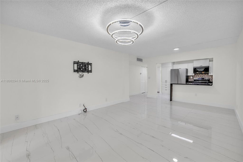 Photo of 4154 NW 90th Ave #104, Coral Springs, FL 33065 (MLS # A11806294)