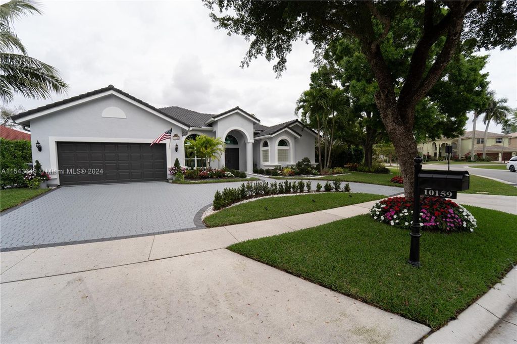 Photo of 10159 Umberland Pl, Boca Raton, FL 33428 (MLS # A11543649)