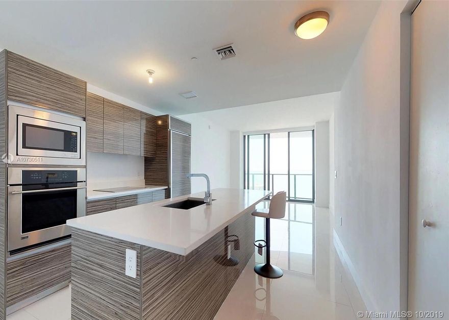 Modern and updated 1 bedroom unit with top of the line kitchen and baths. Amazing water views. Large balcony with access from living room and bedroom. Semi-private elevator. 5 star amenities including, lobby, sky lobby, pool with dressing rooms and sauna, massage rooms, gym, theater, tennis courts, club room with pool table and lounge areas, valet, and 24 hour security. Close to everything that Edgwater and Downtown Miami has to offer including the Perez Art Museum, Frost Science Center, American Airlines Arena, Wynwood, and so much more!