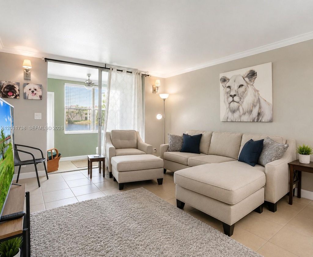 Photo of 2900 W Sunrise Lakes Dr #101, Sunrise, FL 33322 (MLS # A12011738)