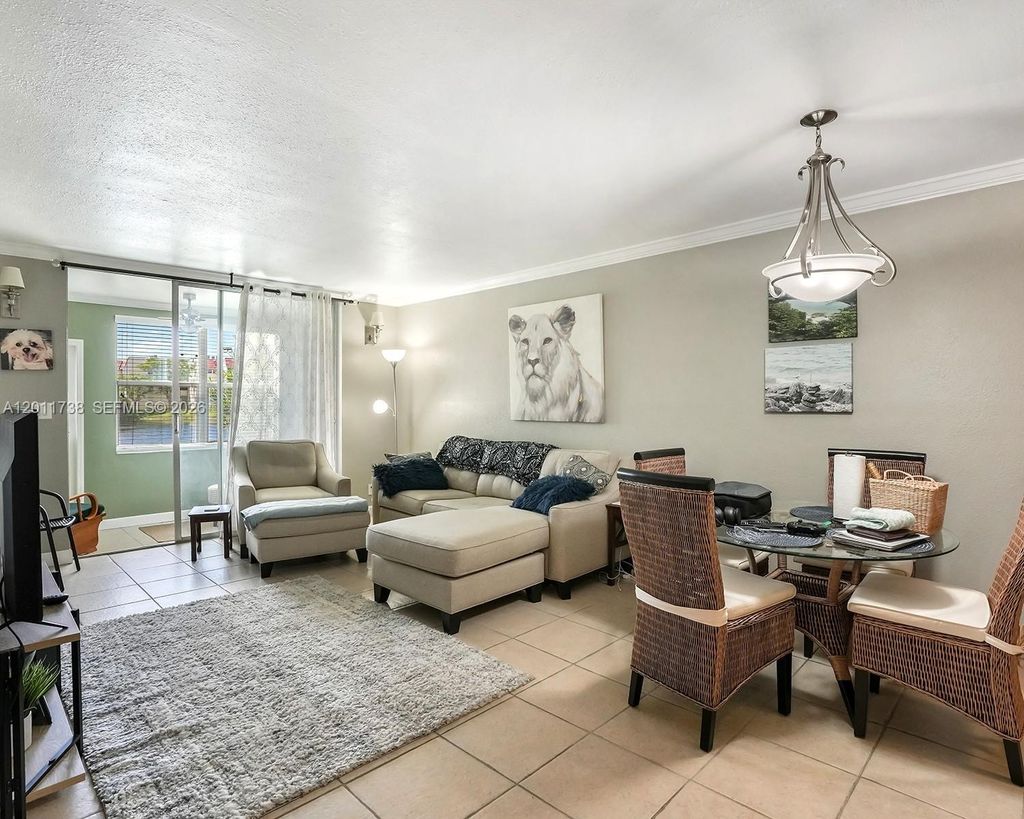 Photo of 2900 W Sunrise Lakes Dr #101, Sunrise, FL 33322 (MLS # A12011738)