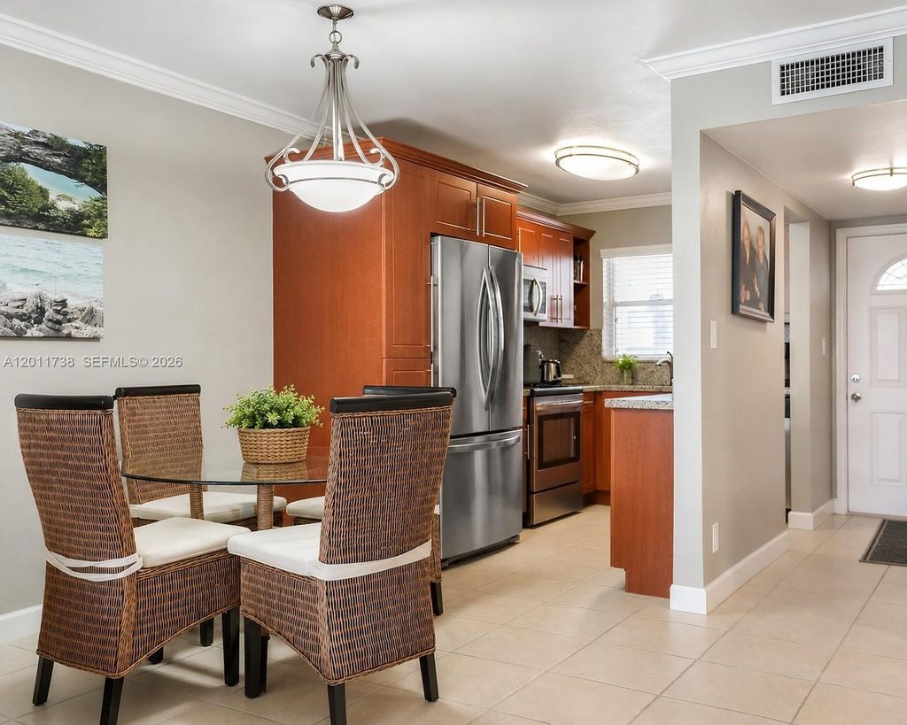 Photo of 2900 W Sunrise Lakes Dr #101, Sunrise, FL 33322 (MLS # A12011738)