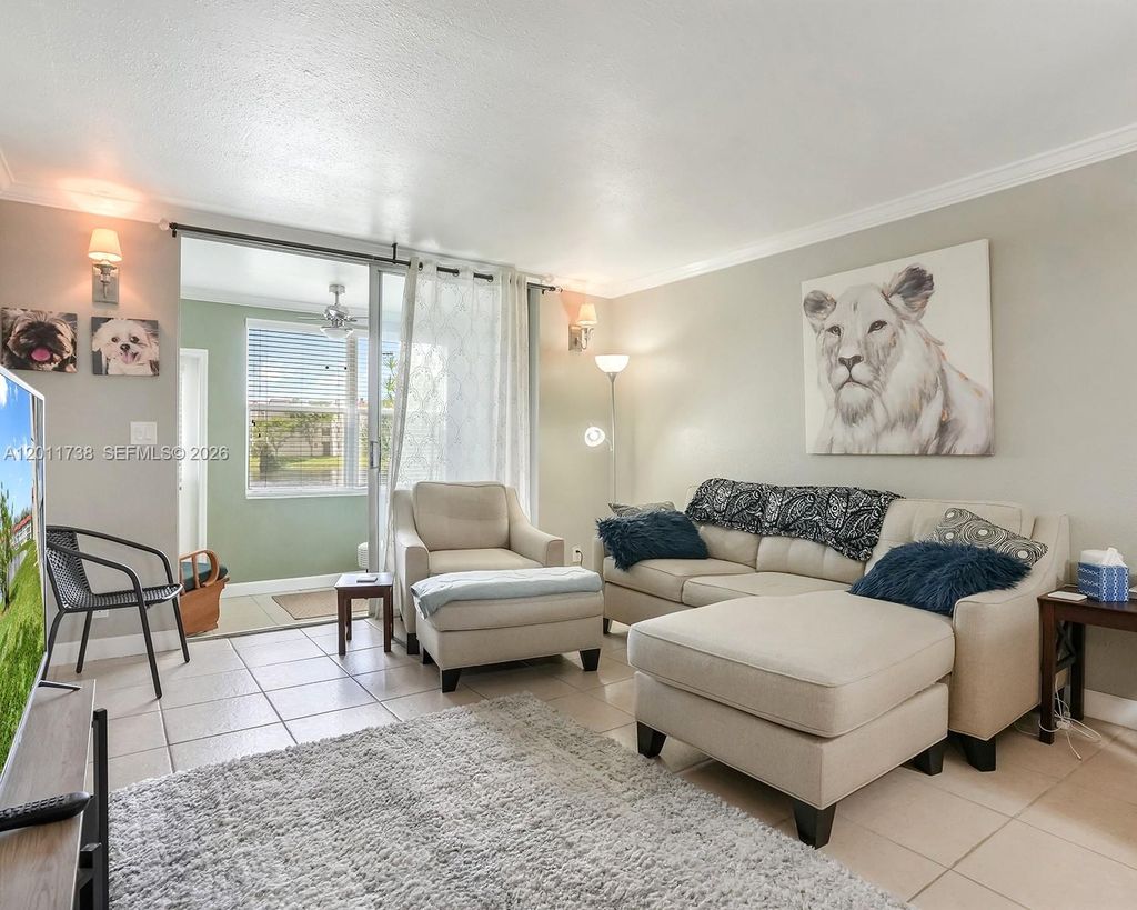 Photo of 2900 W Sunrise Lakes Dr #101, Sunrise, FL 33322 (MLS # A12011738)