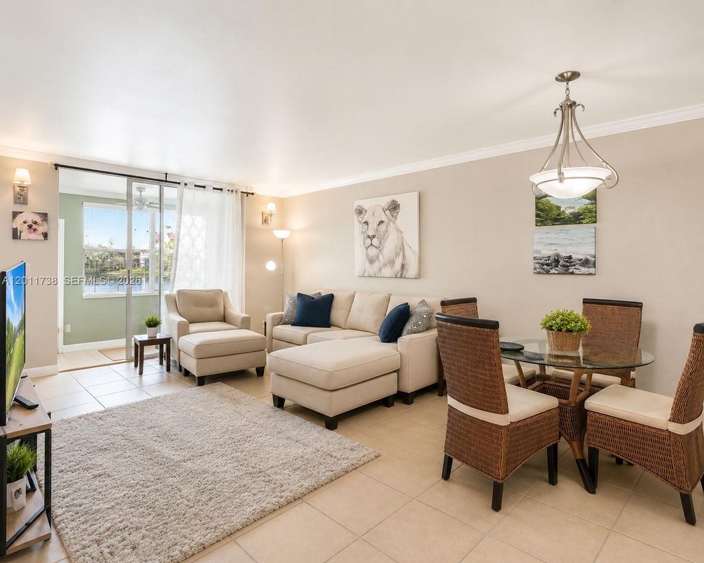 Photo of 2900 W Sunrise Lakes Dr #101, Sunrise, FL 33322 (MLS # A12011738)
