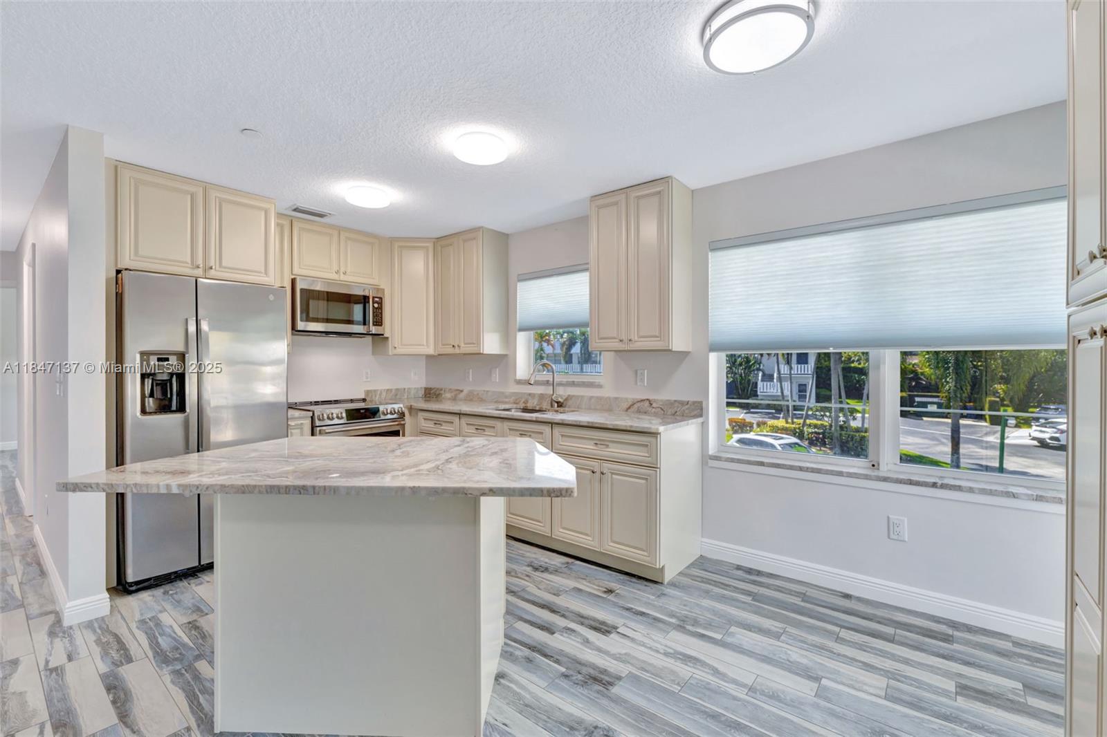 Discover the charm and incredible potential of this inviting 2nd-floor corner unit. Built from the ground up in 2020, this brand-new building stands out as the only new construction in the entire complex. The bright, open kitchen is designed to maximize the benefits of the corner layout, providing an inviting atmosphere for cooking and entertaining. With modern renovations, an exclusive attic space on the top floor, and essential features like a sprinkler system and impact-resistant windows and doors, this unit combines comfort and safety. 55 COMMUNITY—don’t let it slip away! 5 minutes to Stuart Beach, Elliot Museum, and Publix, 1 mile to brand new Sailfish Sands Municipal Golf Course, 2 miles to downtown Stuart, Sewalls Point Plaza & Cedar Pointe Plaza. Best location in Stuart, Florida.