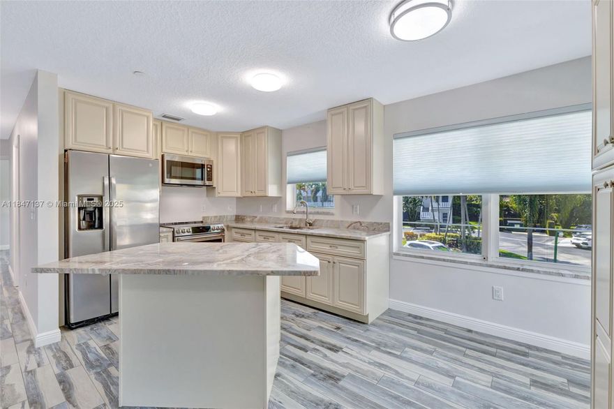 Discover the charm and incredible potential of this inviting 2nd-floor corner unit. Built from the ground up in 2020, this brand-new building stands out as the only new construction in the entire complex. The bright, open kitchen is designed to maximize the benefits of the corner layout, providing an inviting atmosphere for cooking and entertaining. With modern renovations, an exclusive attic space on the top floor, and essential features like a sprinkler system and impact-resistant windows and doors, this unit combines comfort and safety. 55 COMMUNITY—don’t let it slip away! 5 minutes to Stuart Beach, Elliot Museum, and Publix, 1 mile to brand new Sailfish Sands Municipal Golf Course, 2 miles to downtown Stuart, Sewalls Point Plaza & Cedar Pointe Plaza. Best location in Stuart, Florida.