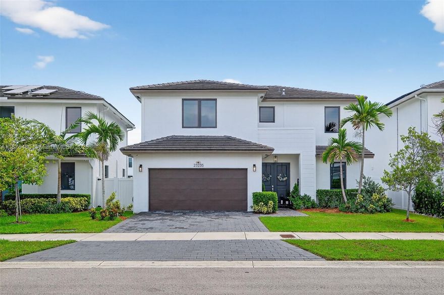 This approximately 2,500 square foot house features four bedrooms and three and a half bathrooms. The primary bedroom offers ample closet space and an en-suite bathroom. The remaining three bedrooms are well-proportioned and versatile in their use. The three and a half bathrooms are thoughtfully placed throughout the home, providing convenience and privacy. The open floor plan creates a seamless flow between the living, dining, and kitchen areas, ideal for entertaining or daily living. The kitchen offers ample counter space, plenty of cabinetry, and a suite of appliances. Adjacent to the kitchen, the dining area provides a formal setting for meals, while the living room offers a comfortable space for relaxation. The home's exterior boasts a well-maintained landscaped yard!