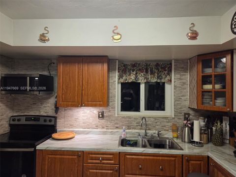 Photo of 800 NW 48th Ter, Plantation, FL 33317 (MLS # A11947669)