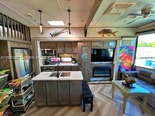 Looking for a great place to vacation? or investment property? Here is a great property in the heart of Key Largo that offers, 3/b 1/b new RV trailer with water access via boat ramp, amazing water view and breath-taking sunsets. Restaurants, shopping and 1 hour from airports, ports and malls. Tour the keys islands on your boat, car or motorcycle. Love to give you a tour today. Seller Finance Psble.