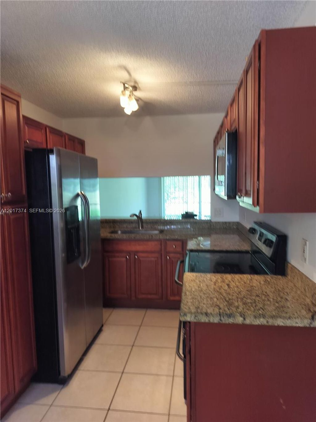 Photo of 1001 Keystone Dr #F, Jupiter, FL 33458 (MLS # A12017374)