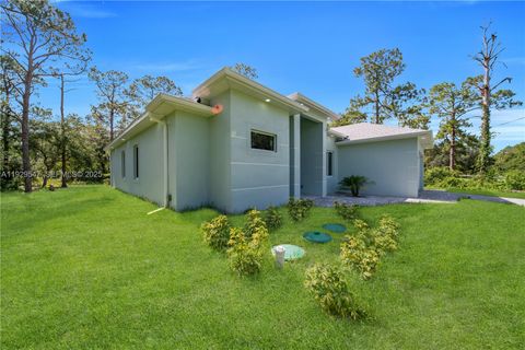 Tiny photo for 1912 Roosevelt Ave, Lehigh Acres, FL 33972 (MLS # A11929547)