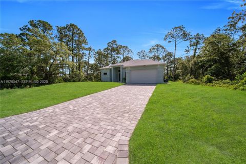 Tiny photo for 1912 Roosevelt Ave, Lehigh Acres, FL 33972 (MLS # A11929547)