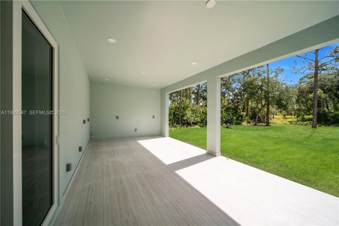 Tiny photo for 1912 Roosevelt Ave, Lehigh Acres, FL 33972 (MLS # A11929547)