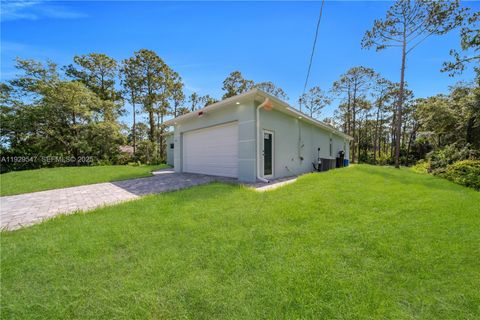 Tiny photo for 1912 Roosevelt Ave, Lehigh Acres, FL 33972 (MLS # A11929547)
