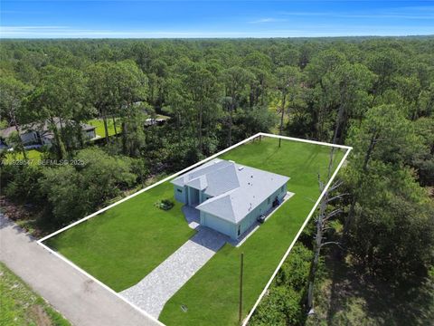 Tiny photo for 1912 Roosevelt Ave, Lehigh Acres, FL 33972 (MLS # A11929547)