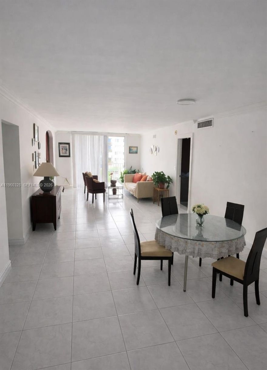 Spacious 2-bedroom, 2-bath + den condo in the heart of North Miami. The den can be used as a home office, guest room, or potential 3rd bedroom. Bright unit with ceramic floors throughout, ample living/dining area, and generous closet space. Located in a well-maintained building with elevator and assigned parking. Conveniently close to shopping, dining, schools, and major highways. Great opportunity for end-users or investors. Easy to show.

Association Information:
Monthly association fee is $698.37.
Special assessment of $71.49/month in effect from August 2025 through July 2026.
Additional lifetime reserve contribution of $119.91/month.

Buyer to verify all association information, fees and assessments directly with the association.