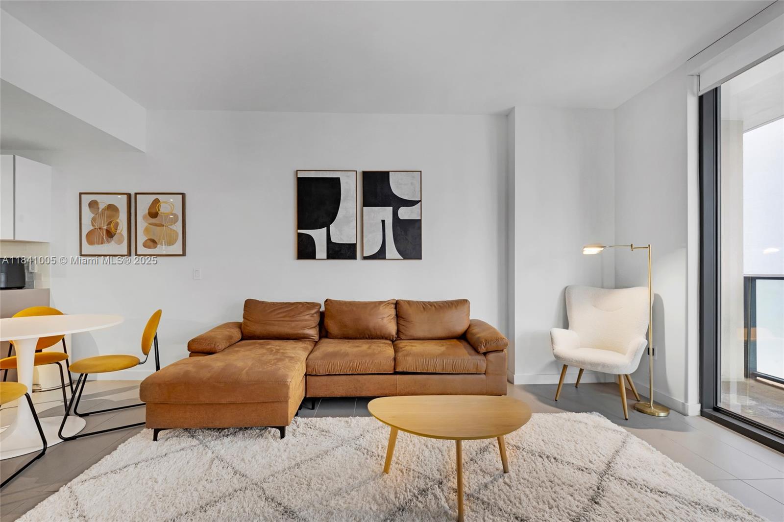 Live in style at this modern 1-bed, 1-bath condo (754 SF) in Edgewater, Miami. Enjoy an open layout, chic decor, and a private balcony with stunning bay and city views. Canvas Condos offers top-tier amenities—rooftop and bayview pools, gym, yoga room, sauna, theater, valet, 24/7 concierge, and assigned parking. Ground-floor retail includes Aroma Espresso Bar.