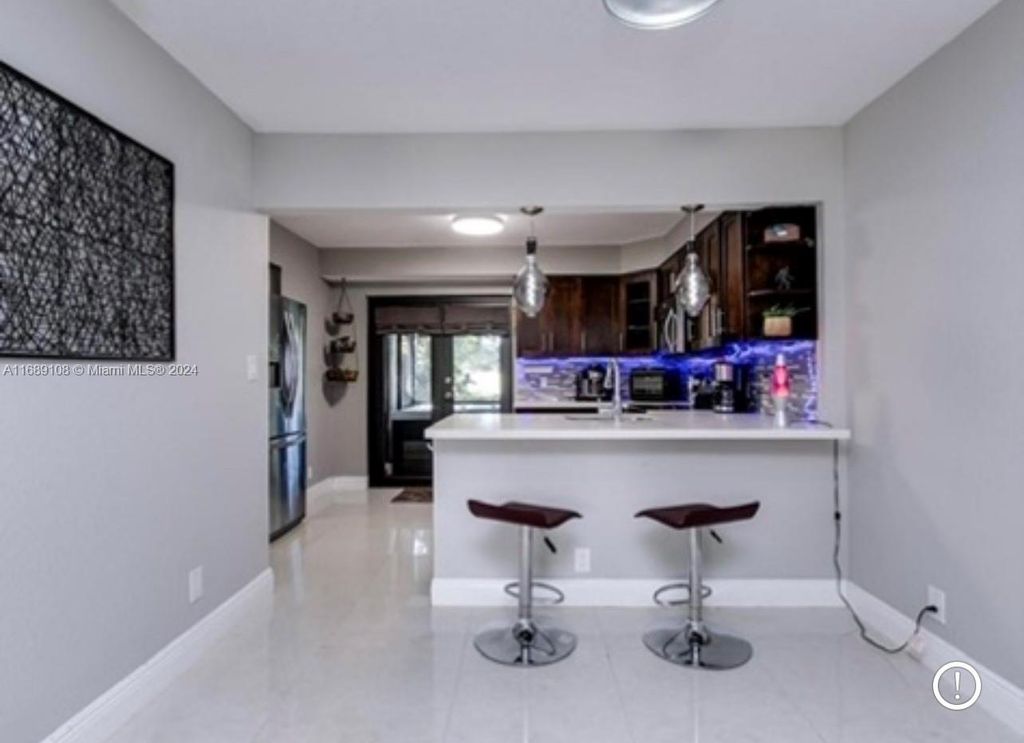 Photo of 227 Wimbledon Lake Dr #227, Plantation, FL 33324 (MLS # A11689108)