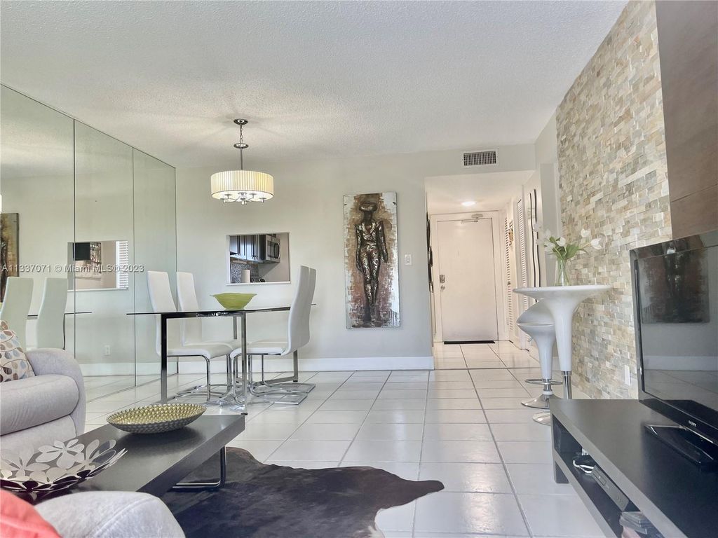 Photo of 5100 Washington St #506, Hollywood, FL 33021 (MLS # A11337071)