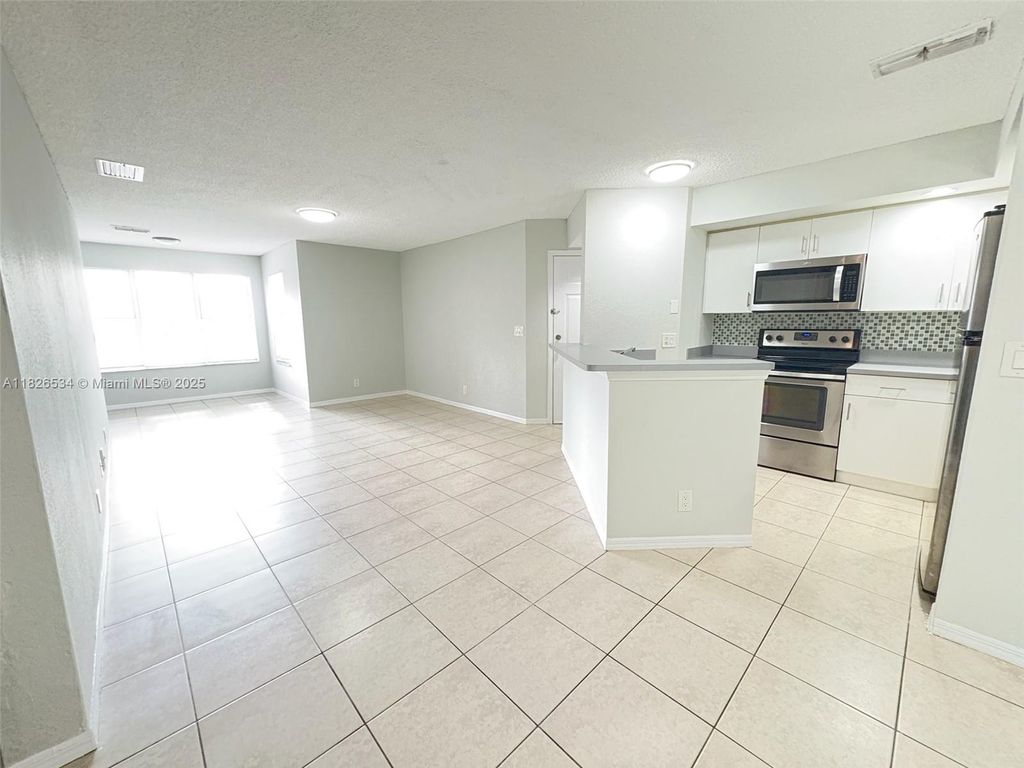 Photo of 3480 N Pinewalk Dr N #124, Margate, FL 33063 (MLS # A11826534)