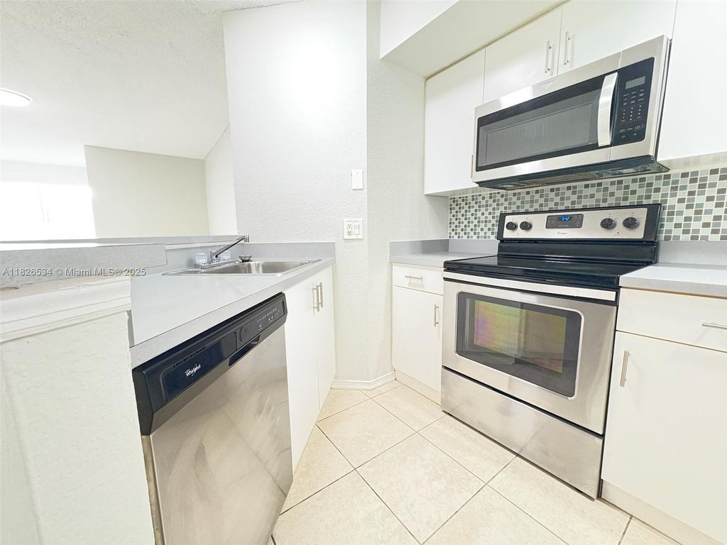 Photo of 3480 N Pinewalk Dr N #124, Margate, FL 33063 (MLS # A11826534)