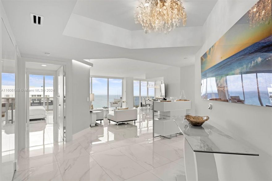 Experience luxury living in this exquisite completely remodeled 3-bedroom, 3-bathroom unit. Spanning 1,980 sq ft, this residence includes two spacious terraces offering breathtaking direct oceanfront and bay views. Floor-to-ceiling windows flood the interior with natural light, highlighting the open-concept kitchen with top-tier finishes. The principal suite boasts a custom walk-in closet and a luxurious en-suite bathroom featuring a soaking tub and a sleek glass shower. Every detail exudes elegance, from the stylish flooring to the contemporary, airy design. Enjoy access to Blue Diamond’s outstanding amenities, situated in the vibrant heart of Miami Beach.