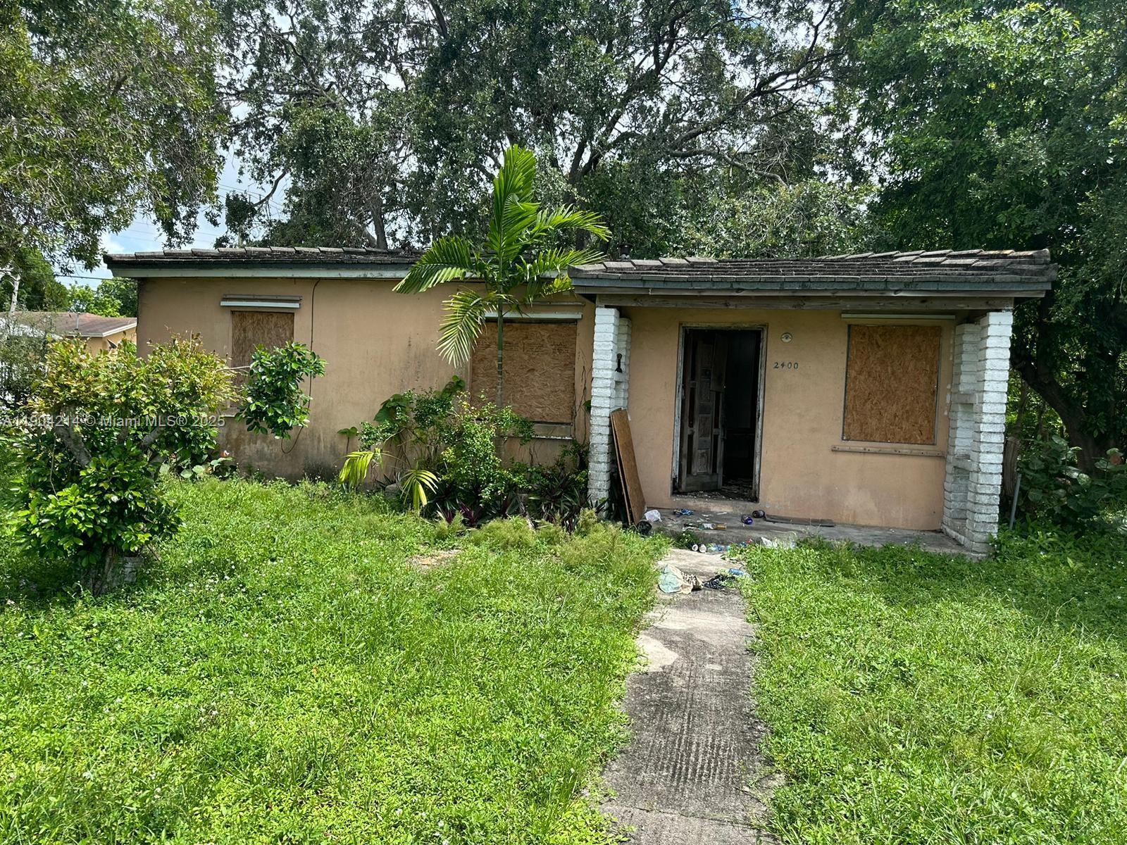 Excellent opportunity for a savvy investor or flipper! This 3/1 single-family home offers solid bones and sits on a good-sized lot with plenty of upside. Property requires complete rehab but has strong resale potential given nearby renovated comps. Located minutes from Wynwood, Design District, and major commuter routes. Easy to show — bring your contractor!