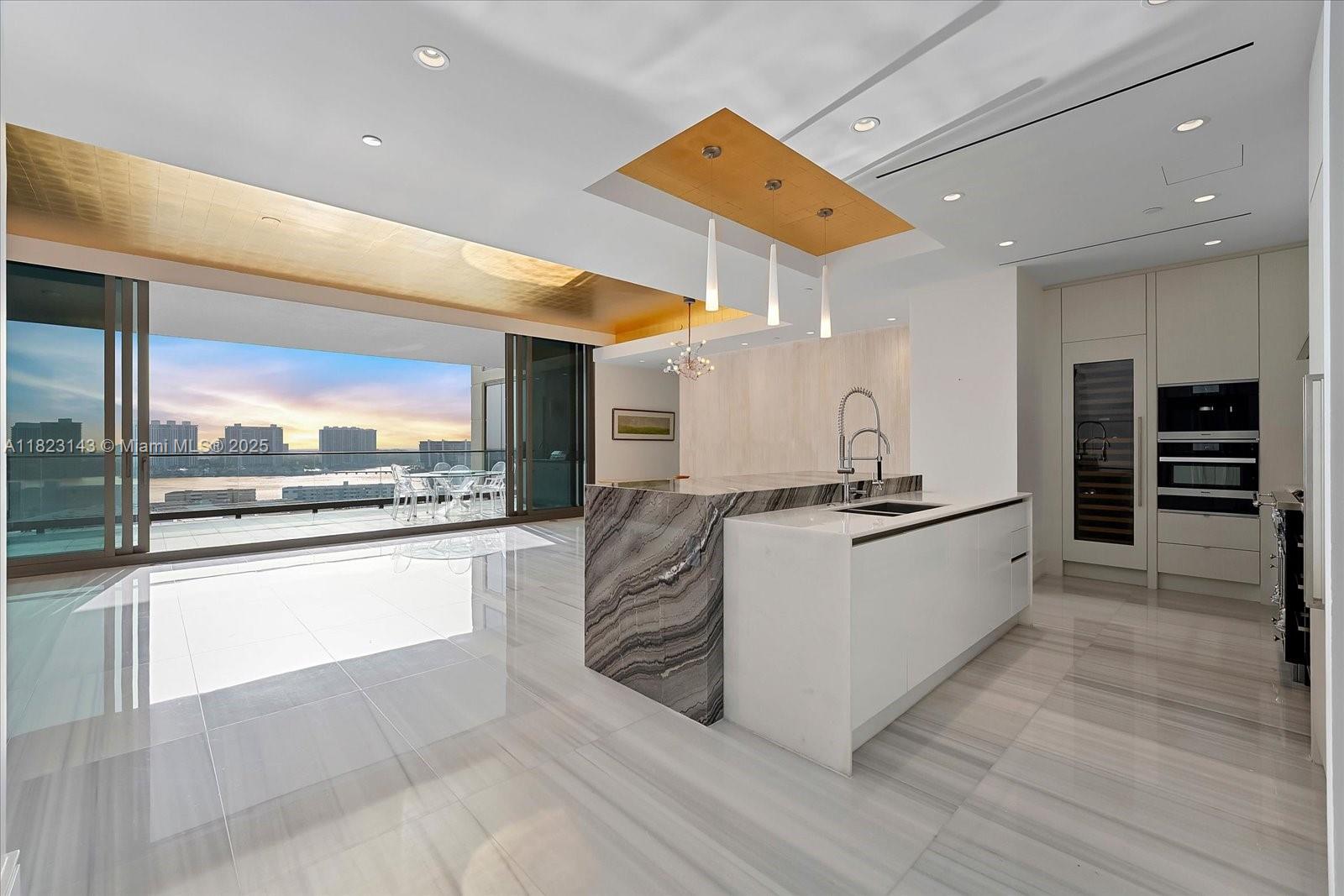 Welcome to The Estates at Acqualina, Sunny Isles' most prestigious address. RARE 1 of only 12 Positano units in the building. This exquisite 3-bedroom + den, 4.5-bathroom residence is a masterclass in design and detail, featuring 10-foot ceilings, floor-to-ceiling telescopic doors, extra storage area, and polished marble flooring throughout. Custom finishes include luxurious Venetian plaster walls, designer wallpapers, and hand-painted electrical outlets, elevating the home’s elegance and individuality. . Enjoy breathtaking Intracoastal and city views from your terrace with a summer kitchen and Jacuzzi. Includes maid’s quarters. Amenities: 5 restaurants, 3 pools, Rolls-Royce house car, daily breakfast, cinema, bowling, golf simulator, basketball, and ice skating.