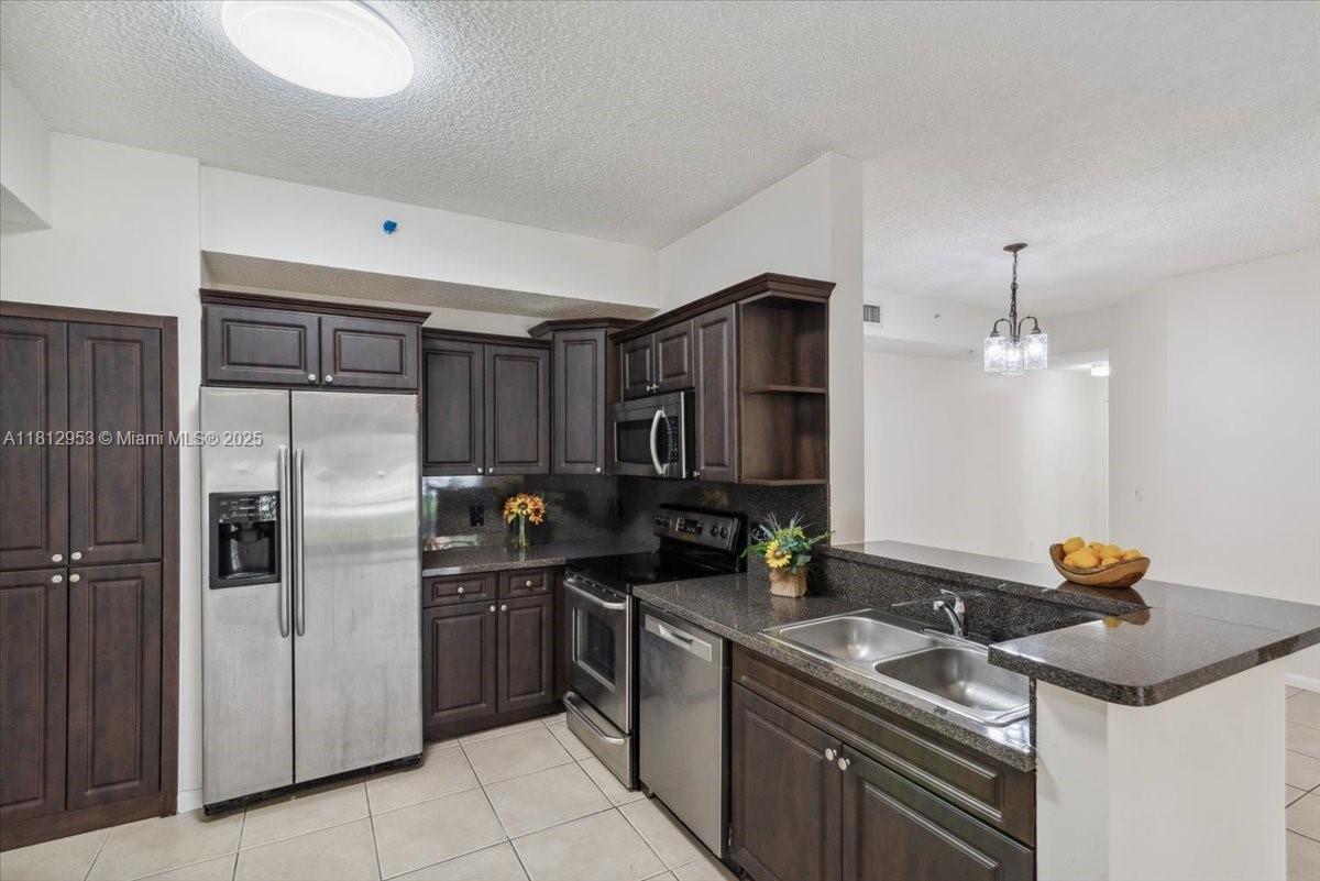 COURTYARDS AT DAVIE CONDO - Residential
