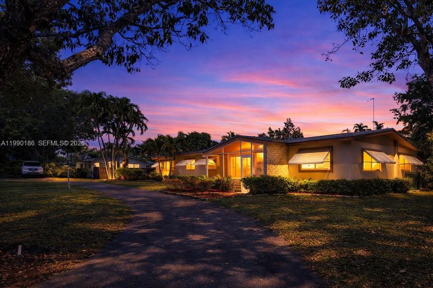 Fantastic 1-story estate home in Palmetto Bay. 3 bedrooms, 2 bathrooms with a spacious added family room located on a quiet tree-lined street, on a large 19,028 sq ft corner lot in the Coral Reef Estate subdivision. This home is larger than tax rolls state. All Terrazzo and tiled floors throughout. The split floor plan features a large master bedroom and bathroom on one side, and 2 bedrooms with 1 bathroom on the other. Gorgeous, spacious, upgraded kitchen opens to the breakfast area, which can also be used as an office/play/den area. Large living and dining areas, with a huge family room. The furniture is virtually staged, not to scale. Partial impact window and accordion shutters. 2-car garage. Lovely family neighborhood. Dome-screened pool and covered patio. Lushly landscaped. 2025 School rating: A+ for Coral Reef Elementary, Southwood Middle, and Palmetto Senior High. Close to Coral Reef Park, which offers newly opened pickleball courts and a kids' playground, and is ideal for walking, picnicking, and family events. This won't last. This is a winner. Priced to sell quickly!
