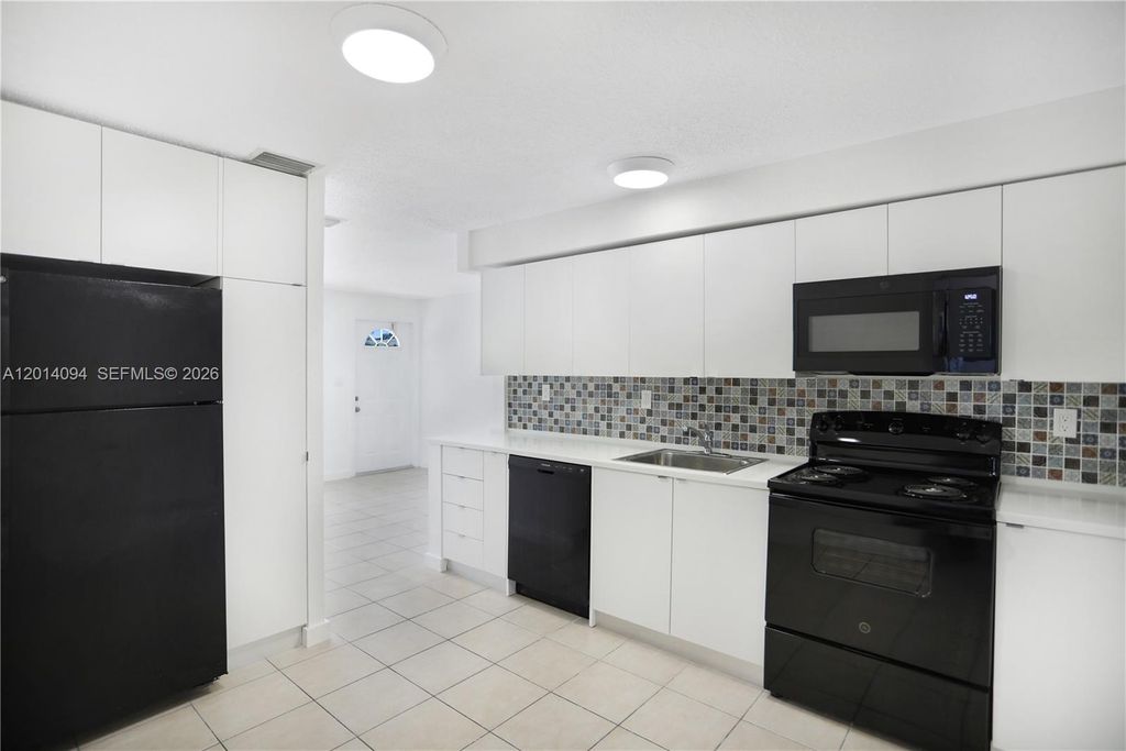 Photo of 1522 SW 30th St #1, Fort Lauderdale, FL 33315 (MLS # A12014094)