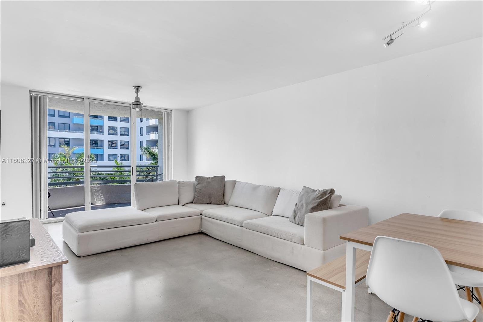 The Sails is boutique 5-story condominium right in the heart of South Beach. Conveniently located to everything you need, residents can easily shop at the nearby Trader Joe's, Whole Foods, or Publix. Or take a stroll and dine-in at Sunset Harbour, Lincoln Road, or West Avenue. Enjoy the views of Biscayne Bay, Star Island, the Cruise-ship port, and the stunning Miami skyline, from the balcony of this beautiful top-floor 2-bedroom, 2-bathroom unit. This modern unit features a bright open kitchen, full-size washer/dryer, ample closet space, & a garage space. The Sails is a well-maintained, pet-friendly building, with a secure entrance, elevator, pool area, and sun deck.