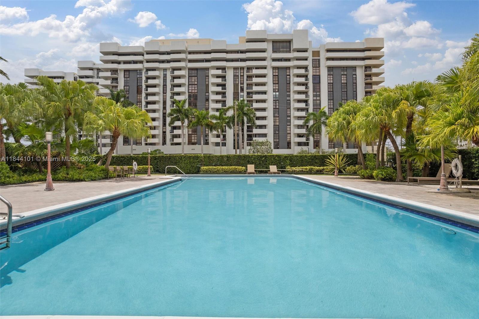 Welcome to this spacious 2-bed/2-bath condo in the heart of Coral Gables. Bright & inviting condo features open-concept living area with rich dark wood floors, large sliding glass doors (impact windows) large balcony. The renovated kitchen has quartz countertops, stainless steel appliances, and modern cabinetry, accented by a stylish tile backsplash. The large primary suite includes an en-suite bathroom with a dual sink vanity. Modern light fixtures throughout the unit. Community amenities include a pool, hot tub and sauna. Located just steps from Miracle Mile, fine dining, golf, shopping, walking distance to the country club, a New lifestyle is awaiting for you! don’t miss this opportunity this unit is the biggest available for sale in the building, schedule your showing today!