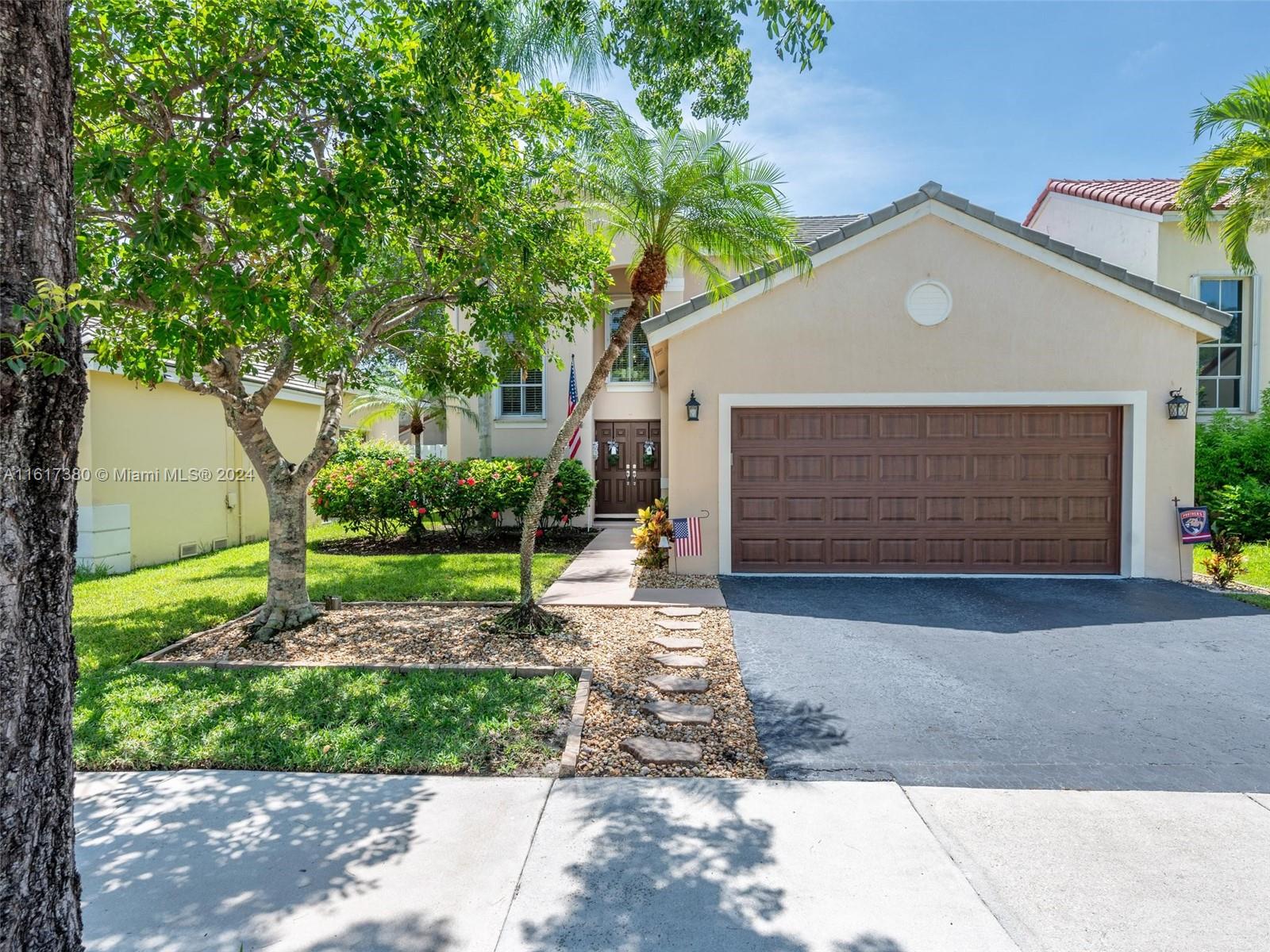 Pride in ownership awaits you at your New Home Sweet Home! Welcome to this EXTREMELY well maintained 4 bedroom, 2 1/2 bath home in the Lakes. Recent upgrades including; painted neutral throughout, NEWER ROOF (2018), AC (2019), water heater (2019) & garage door (2018). Open concept kitchen, living & dining room on the first floor creates the perfect space for entertaining. Master suite on first floor w/ custom closets & master bathroom. Three additional large bedrooms on 2nd floor w/ custom closets & renovated bathroom. Large screened in porch & backyard w/ plenty of room for the kids to play. The Lakes is one of Westons most coveted communities, centrally located w/ manned guard gate, parks, soccer field, playground, community pool & top "A" schools.