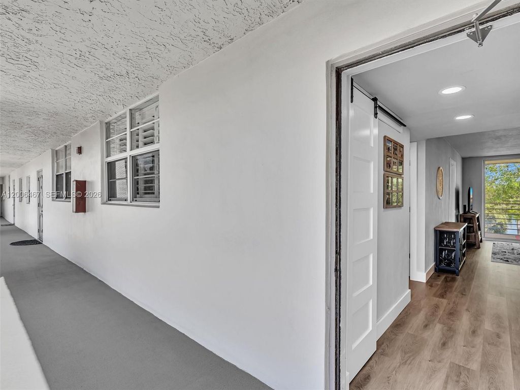 Photo of 9340 Lagoon Pl #303, Davie, FL 33324 (MLS # A12006467)