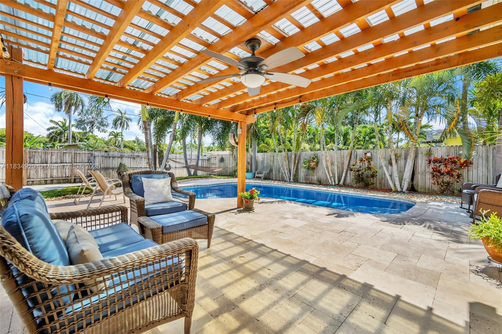 Welcome to your dream home in the heart of Hollywood Beach—this hidden gem has it all! Fully remodeled, this 3-bedroom, 2-bathroom home blends modern luxury with beachside charm. Enjoy an open-concept layout with sleek wood floors, high-end finishes, and a stylish kitchen featuring granite countertops and gas-powered stainless steel appliances. The spacious primary suite features a chic en-suite bathroom and ample closet space. Step outside to your private oasis with a saltwater pool, pergola patio, manicured landscaping, and fenced yard. Minutes to downtown, the beach, Broadwalk, and the airport!