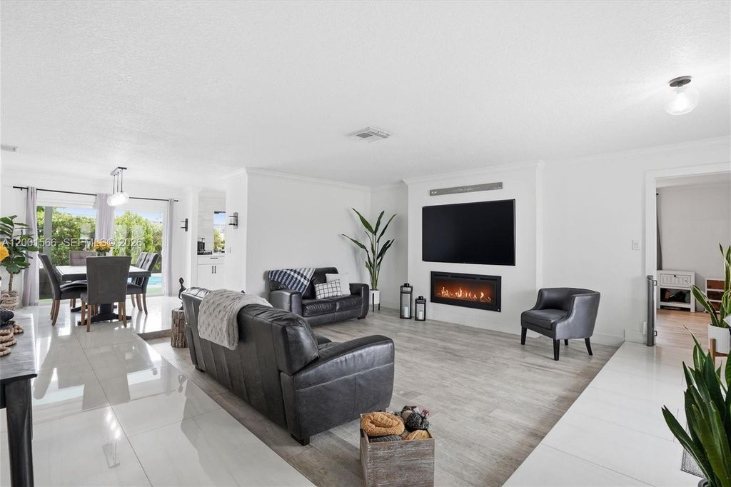 Photo of 11920 NW 31st Pl, Sunrise, FL 33323 (MLS # A12001566)