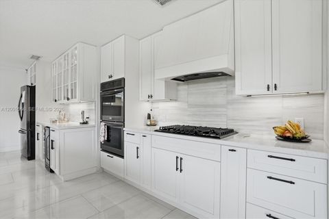 Tiny photo for 11920 NW 31st Pl, Sunrise, FL 33323 (MLS # A12001566)