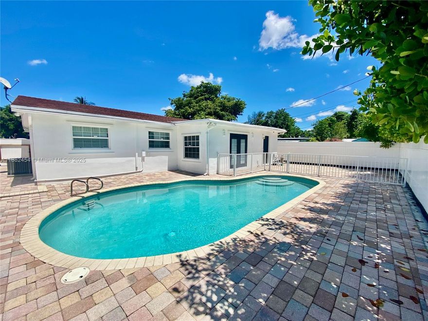 Spacious 4-bedroom home with a versatile den overlooking the pool, ideal as a guest room or office. Freshly painted inside and out, this residence offers a bright, move-in-ready appeal. The large kitchen features an abundance of cabinets and connects to a laundry room with a generous storage closet. Open living and dining areas provide great space for entertaining. The primary suite includes a walk-in closet, new flooring, and modern LED lighting, while the second bedroom also offers LED lights and new tile floors. The features include a tankless water heater for energy efficiency. Outside, enjoy a brand-new modern driveway and carport, plus a fenced backyard with a cozy pool and paver patio perfect for relaxing or entertaining.