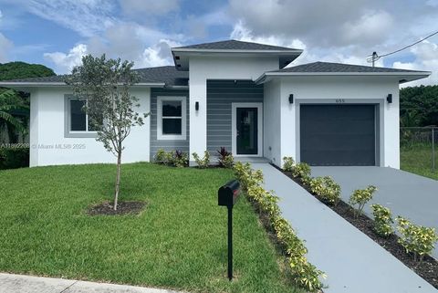 Photo of 655 NW 24th Ave, Fort Lauderdale, FL 33311 (MLS # A11892208)