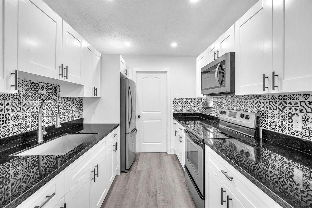 Photo of 7344 SW 8th Ct #2, North Lauderdale, FL 33068 (MLS # A11984150)